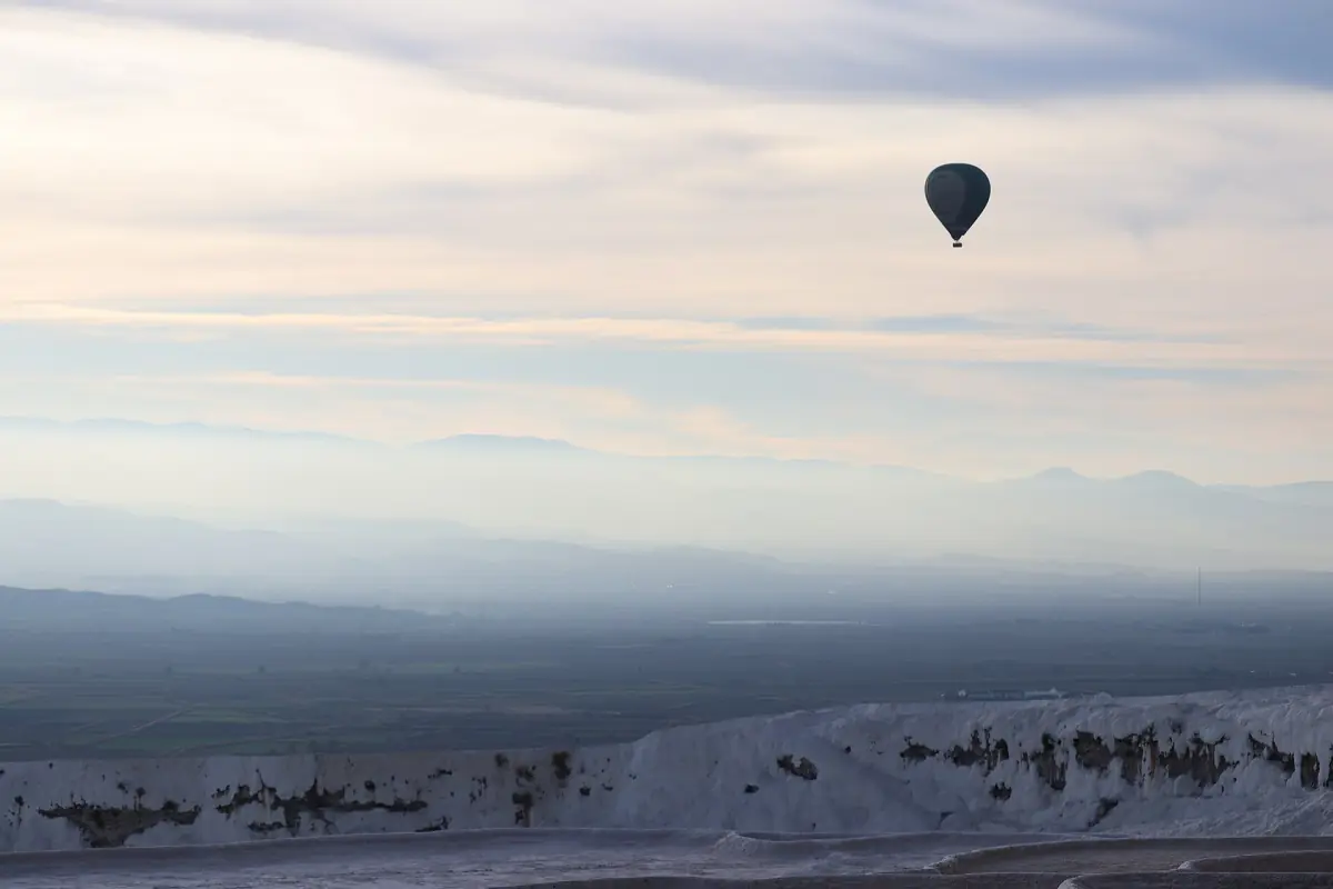 A hot air balloon over the Pamukkale valley